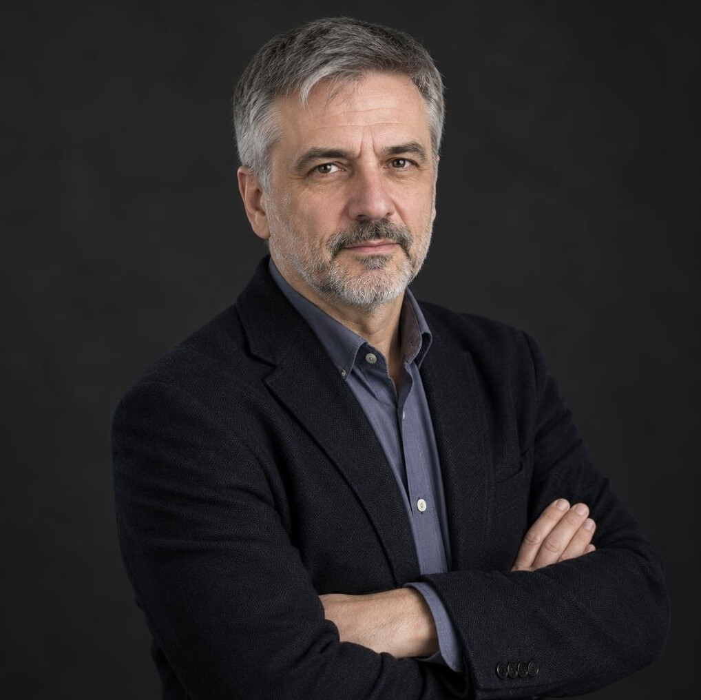 Studio portrait of a middle-aged Croatian male author in a dark jacket